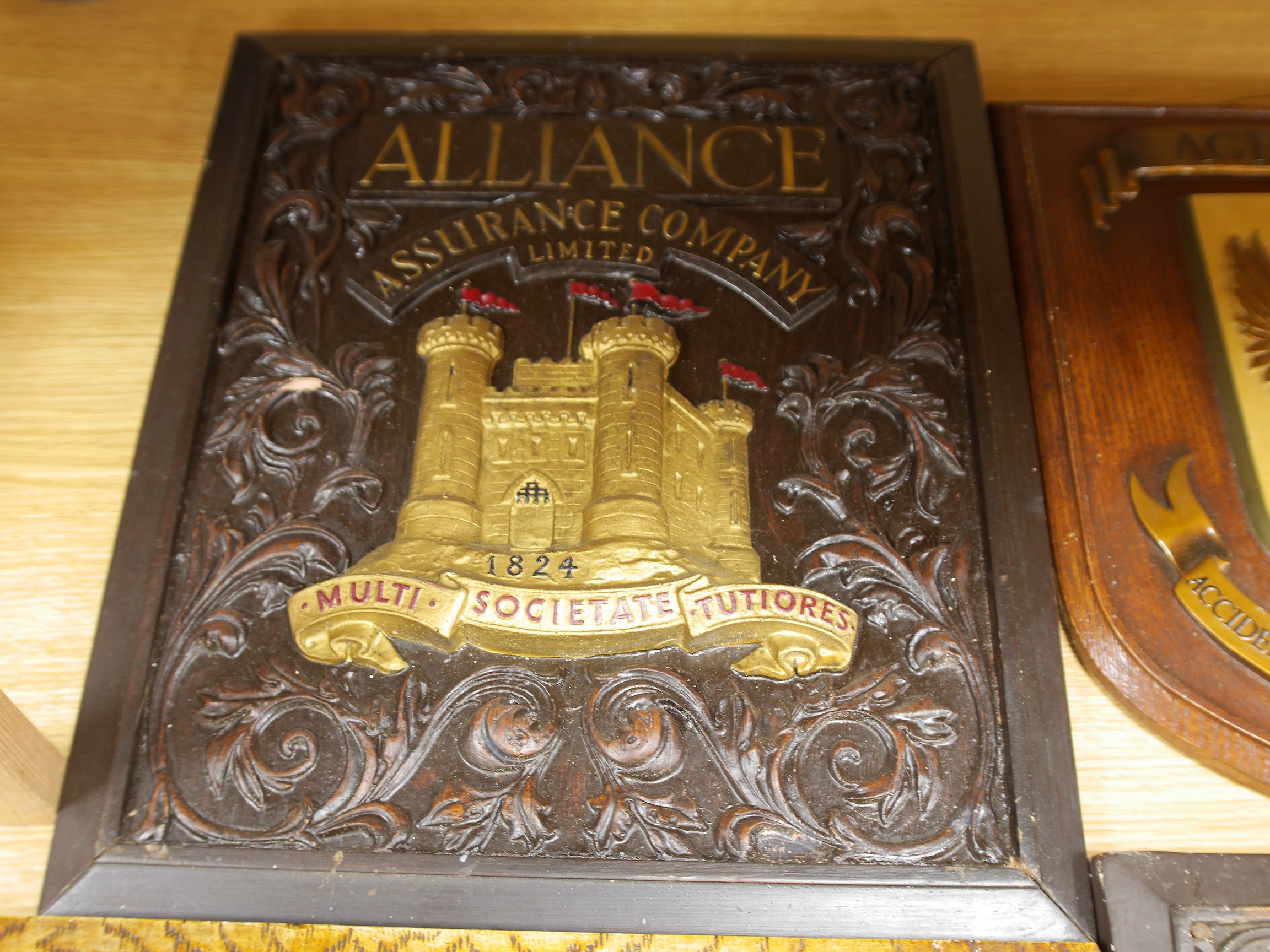 Seven insurance plaques to include The Yorkshire Insurance company and Alliance Insurance Company, largest 46cm high. Condition - varies